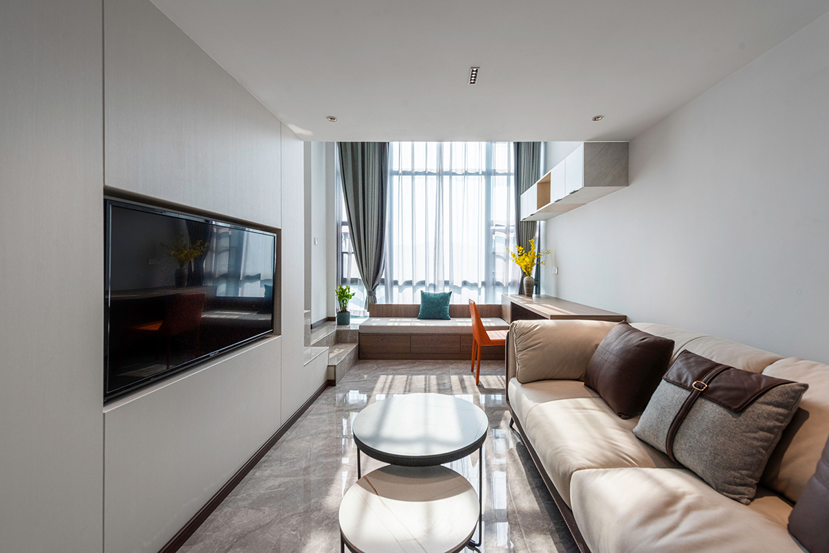 thiết kế nội thất phòng khách căn hộ 32m2 có gác lửng